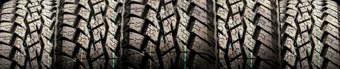 with off-road tire tread texture, auto background, panoramic photo