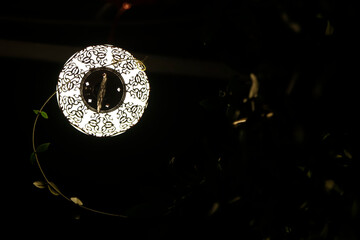 In the historical streets of Balat. Lighting in the windows of the houses
