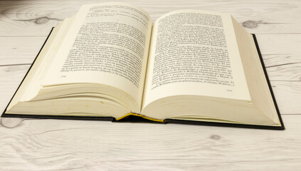 books in a white table