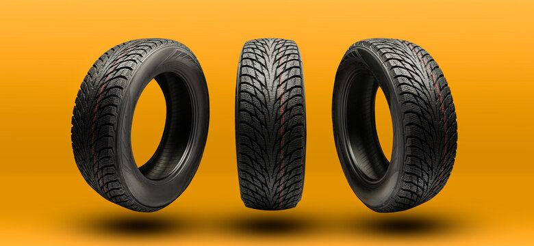 winter tires friction close-up on a bright yellow-orange background