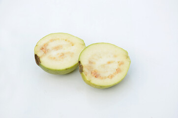 the sliced ripe green white guava fruit isolated on white background.