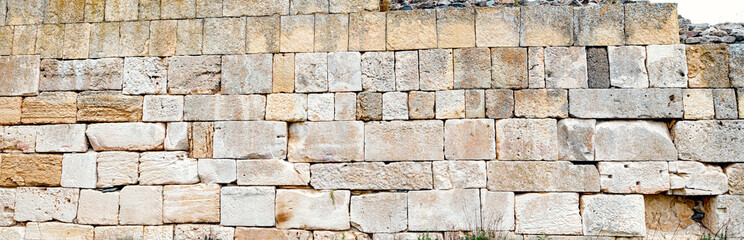 Old stone rock texture pattern. Natural stone wall tiles texture. Old rock rustic textured stone...