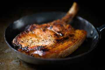 huge rustic pan fried pork chop