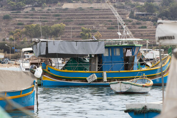 Fototapeta na wymiar Traditional maltese fishing boat in Marsaxlokk. Malta.