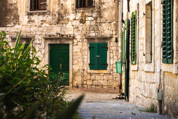 Beautiful old cobbled houses in the narrow streets of the city of Kotor