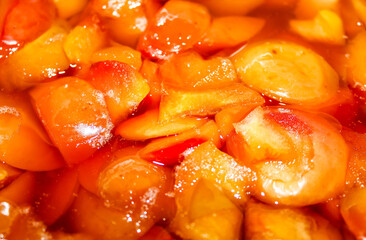 Cooked Apple jam with Apple slices close-up.