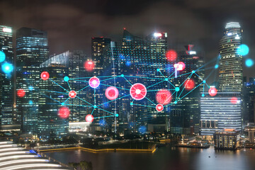 Abstract technology icons, night aerial panoramic cityscape of Singapore, Asia. The concept of innovative approach to optimize international business process. Double exposure.