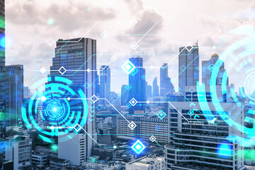 Technology hologram over panorama city view of Bangkok. The largest tech hub in Asia. The concept of developing coding and high-tech science. Double exposure.