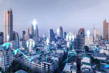 Obraz na płótnie Canvas Social media icons hologram over panorama city view of Bangkok, Asia. The concept of people networking and connections. Double exposure.