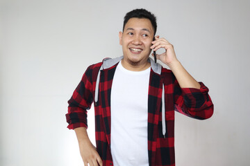 Young Man Talking on his Phone, Happy Smiling Laughing