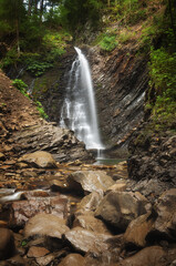 Beautiful cascade of mountain waterfall in Ukrainian Carpathians