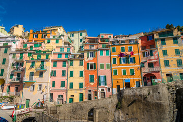 Fototapeta na wymiar Colorful buildings on the seaside town of Riomagiorre, Italy.