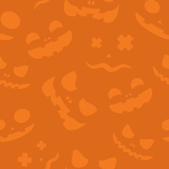 Halloween pattern or pumpkin smiles isolated on orange background. Greeting card or wrapping paper. Halloween background