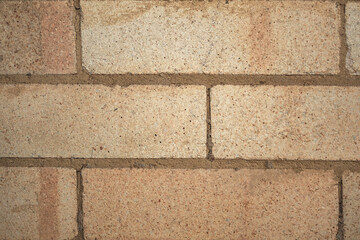 Brick laying. Solid material. Building material. An even row of bricks