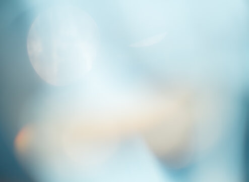 abstract blue blurred background with flare light 