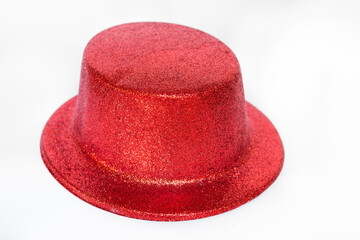 Red glitter party hat isolated on a white background.