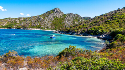 Fototapeta na wymiar Corsica beach with turquoise sea and paradise beach. Saint Florent Corsica France.