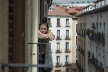 dramatic portrait of young beautiful sad and depressed Asian Korean woman feeling unhappy and worried suffering some problem going through depression and anxiety crisis