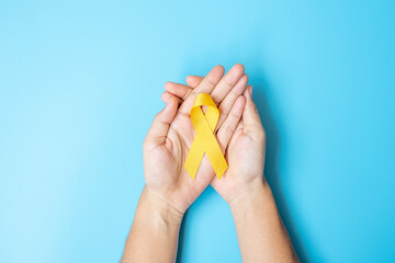 Suicide prevention, Sarcoma, bone, bladder, Childhood cancer Awareness month, woman holding Yellow...