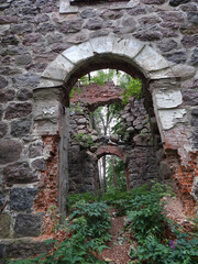 Fototapeta na wymiar Ruins of a beautiful old stone tower or chapels