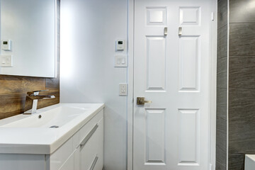 Real estate photography - Beautiful empty renovated apartment in an apartment building with bathroom, new kitchen, new floors, all white painted