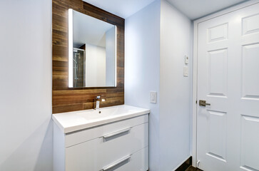 Real estate photography - Beautiful empty renovated apartment in an apartment building with bathroom, new kitchen, new floors, all white painted