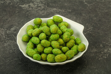 Spicy wasabi peanuts in the bowl