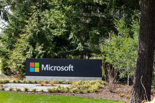Microsoft sign at the technology company's headquarters in Redmond, Washington, with an evergreen background on March 28, 2019
