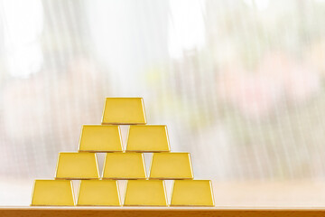 Gold bar with high value for invest put on the desk in the office, Targeting of business to winner...