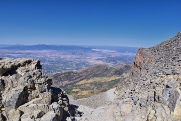 Timpanogos hiking trail landscape views in Uinta Wasatch Cache National Forest, around Utah Lake, in the Rocky Mountains in fall. Views of Midway, Heber, Provo city, Salt Lake and Utah County. USA.