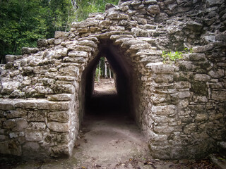 Tunnel made of rocks in a pyramide in Coba, Mexico