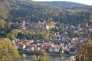 Aerial view of  Heidelberg old town and Castle  with Old Bridge over the river Neckar during sunset in autumn in Heidelberg, Germany