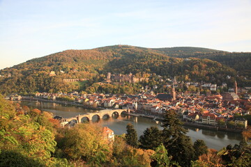 Aerial view of  Heidelberg old town and Castle with Old Bridge over the river Neckar during sunset in autumn in Heidelberg, Germany