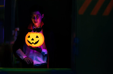 young man dressing halloween vampire costume