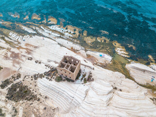 Punta Bianca, Agrigento in Sicily Italy -  White beach with old ruins of abandoned stone house on white cliffs