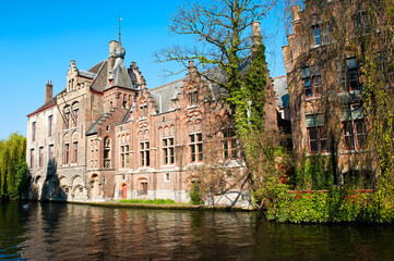 Buildings along a canal, Historic centre of Bruges, Belgium, Unesco World Heritage Site.