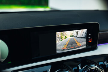 Monitor with parking assistance at the modern car