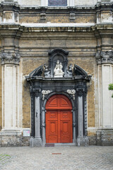 Fototapeta na wymiar Small beguinage Onze-Lieve-Vrouw ter Hoye (Petit béguinage Notre-Dame de Hoye), Church, Door, Ghent, Belgium, Unesco World Heritage Site 