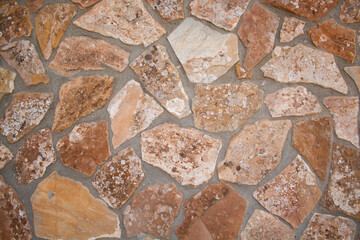 Rustic stone texture used in rural houses.