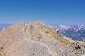 Timpanogos hiking trail landscape views in Uinta Wasatch Cache National Forest, around Utah Lake, in the Rocky Mountains in fall. Views of Midway, Heber, Provo city, Salt Lake and Utah County. USA.