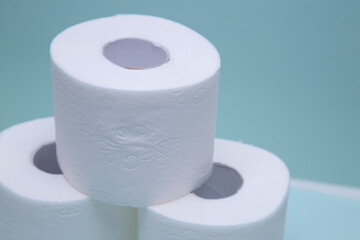 Toilet paper on a green background. Hygiene product.