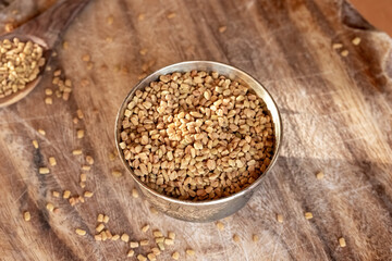 Dry fenugreek seeds in a bowl