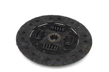 Worn old clutch disc. Part of car transmission.