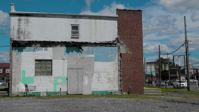 Abandoned Store Buildings on the corner of busy street