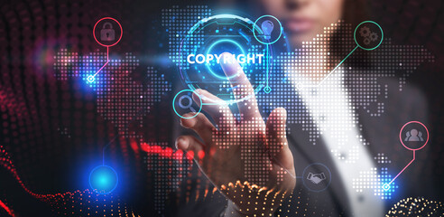 Business, Technology, Internet and network concept. Young businessman working on a virtual screen of the future and sees the inscription: Copyright
