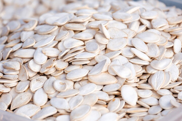 lots of white pumpkin seeds for sale