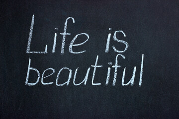 Obraz premium Chalkboard text life is beautiful