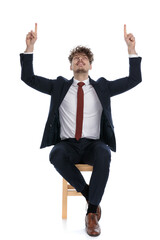 sexy businessman looking up as a sign of gratitude