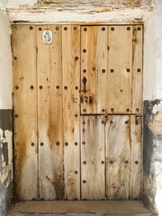 Wooden front door of an old town house