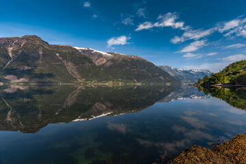 Breathtaking landscapes along the Hardanger fjord and its inner branches, in the traditional Hardanger district of Vestland in Norway.
